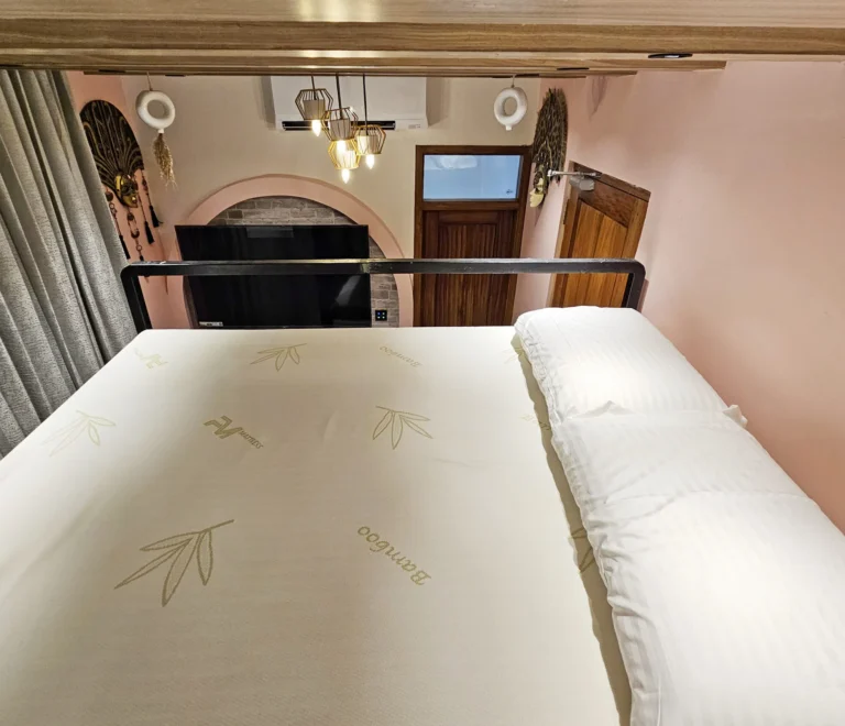 Room-303-–-Mediterranean-Pink-Bunk-A-Seaside-Sanctuary